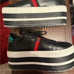Black platform sneakers size 9.